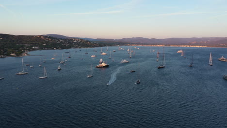 Golfe-de-Saint-Tropez-full-of-boats-aerial-sunrise-France